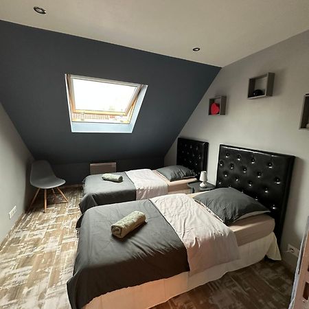 Loc'Apparts Beaumont-sur-Oise Екстериор снимка